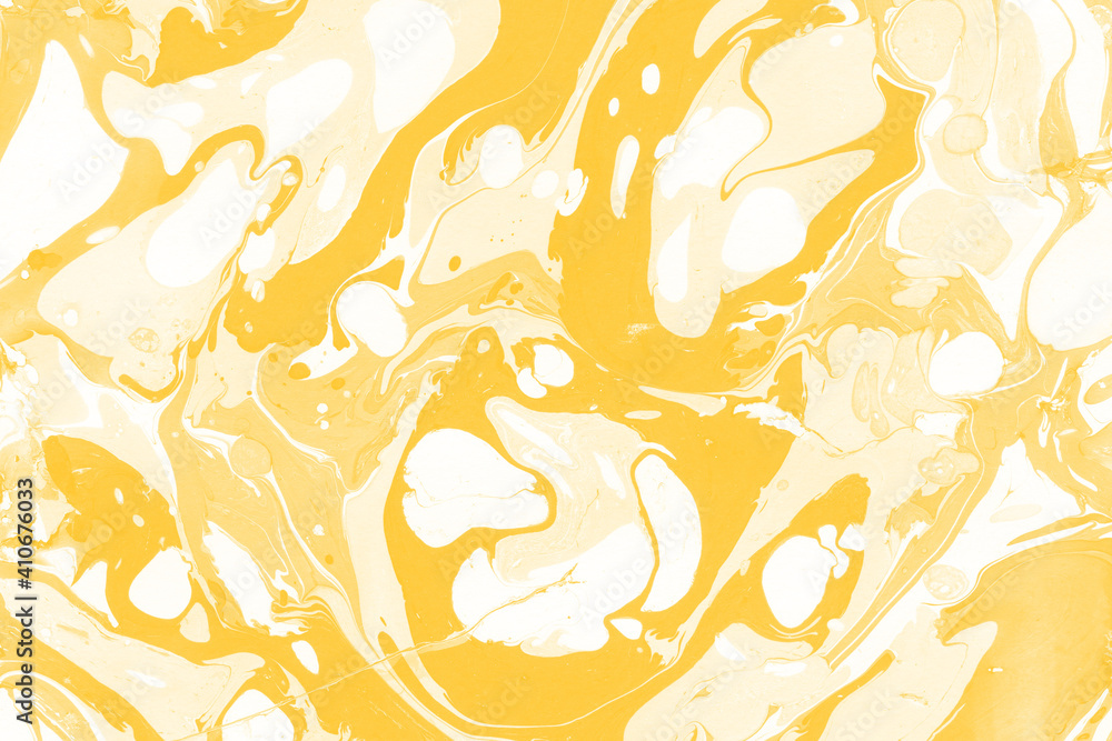 Yellow luxury marble ink texture on watercolor paper background. Marble stone image. Bath bomb effect. Psychedelic biomorphic art.