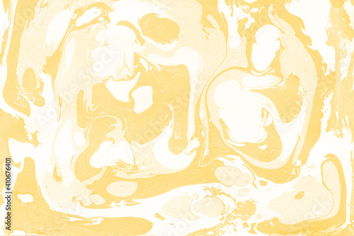 Yellow luxury marble ink texture on watercolor paper background. Marble stone image. Bath bomb effect. Psychedelic biomorphic art.