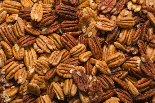 Tasty pecan-nut background. Top view.