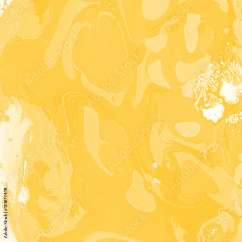 Yellow luxury marble ink texture on watercolor paper background. Marble stone image. Bath bomb effect. Psychedelic biomorphic art.