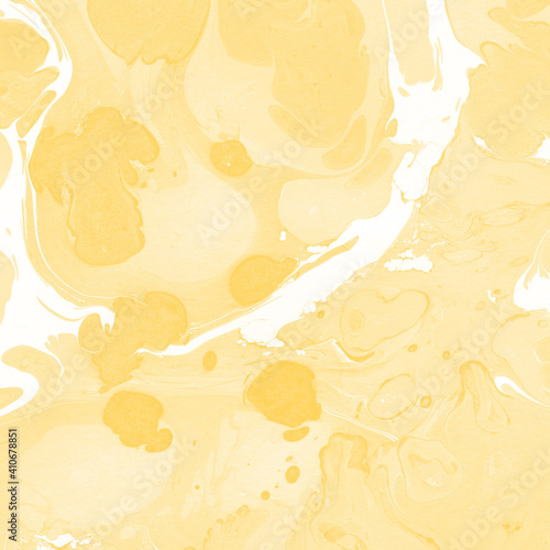 Yellow luxury marble ink texture on watercolor paper background. Marble stone image. Bath bomb effect. Psychedelic biomorphic art.