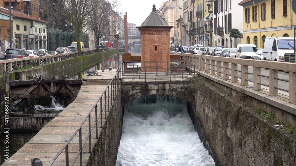 Europe, Italy , Milan February 2021 -  Leonardo Da Vinci closed water dam construction in Navigli Canals during Covid-19 Coronavirus lockdown - downtown empty of tourists 
