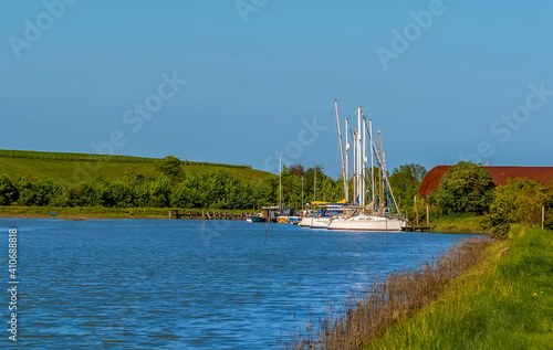 A view out to sea along the creek at Oare near Faversham, Kent on an sunny afternoon photo