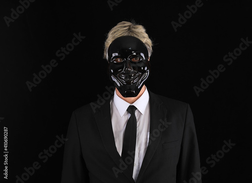 portrait of an unknown in a black mask © serikbaib