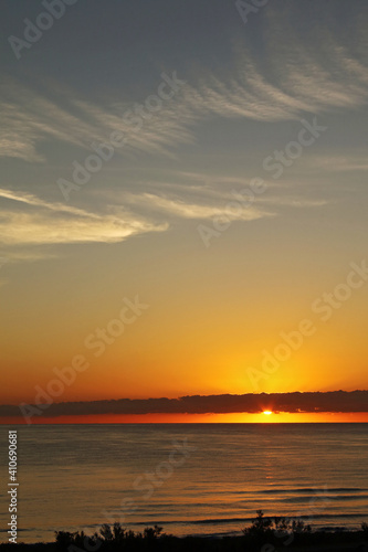 A golden sunrise on the beach  summer morning.