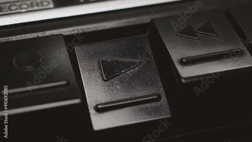 Pressing Play Button On And Off An Black Old Retro Vintage Cassette Tape Player .