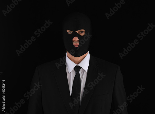 portrait of an unknown in a black mask