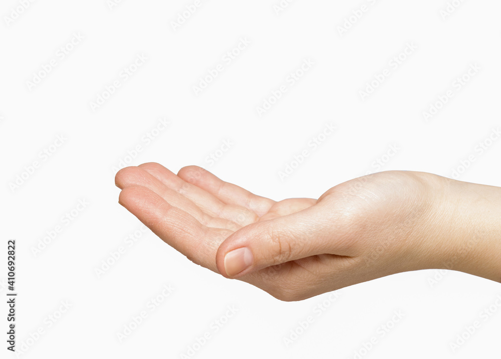 Female caucasian hand slightly bent the palm on a white background isolate. health and beauty concept Female caucasian hand slightly bent the palm on a white background isolate. health and beauty concept