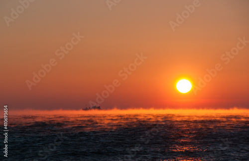 Steam over the water