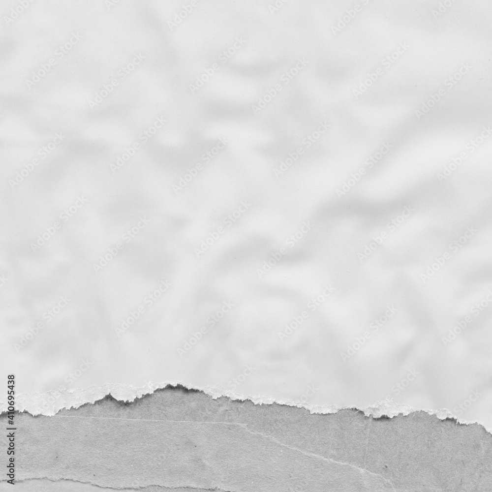 Obraz premium White torn paper collage close-up. Texture made from various paper and cardboard parts. Damaged old paper background. Vintage blank wallpaper. Material design backdrop.