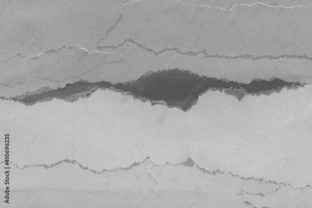 White torn paper collage close-up. Texture made from various paper and cardboard parts. Damaged old paper background. Vintage blank wallpaper. Material design backdrop. White torn paper collage close-up. Texture made from various paper and cardboard parts. Damaged old paper background. Vintage blank wallpaper. Material design backdrop.