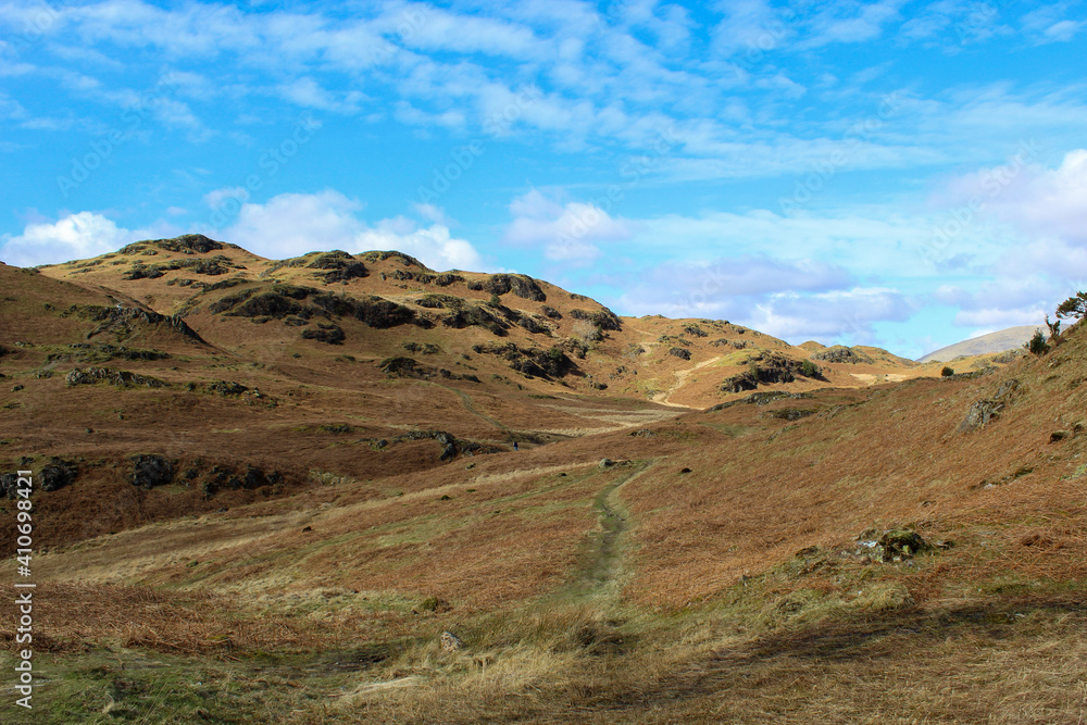 Footpath through mountain valley