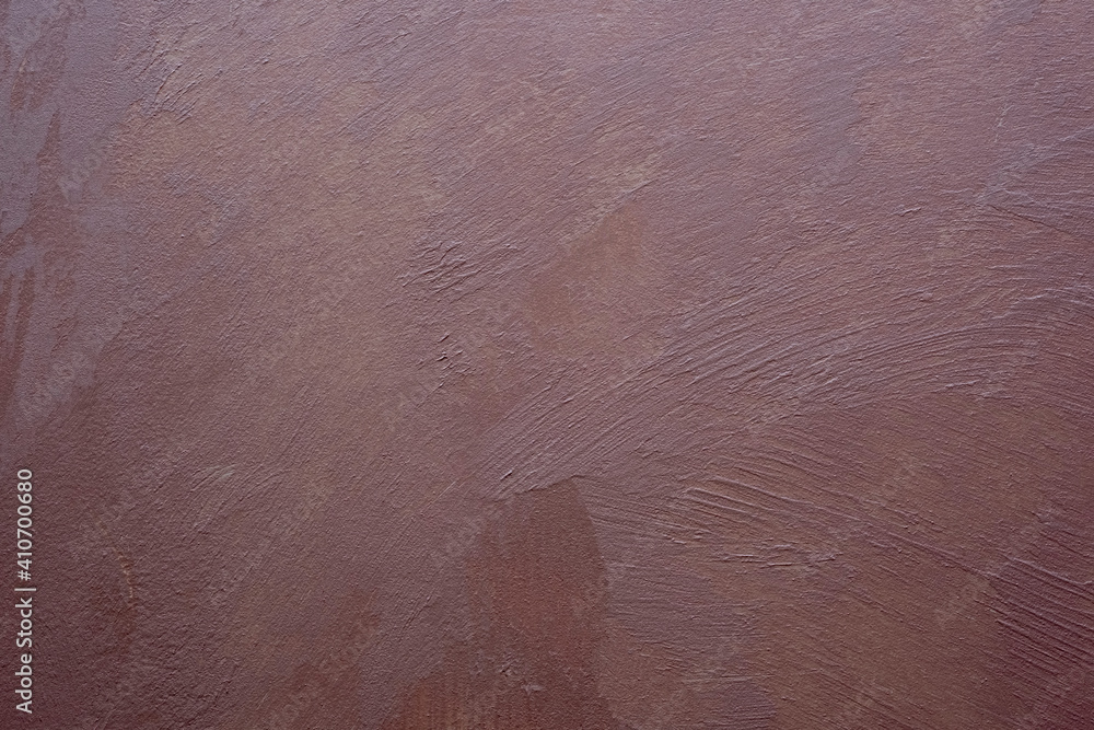 Naklejka premium Beautiful pink decorative plaster applied to the wall