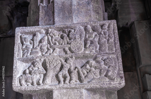 Bagalakote, Karnataka, India - November 7, 2013: Pattadakal temple complex. Gray stone erotic tableau sculpture set in pillar at ambulingeshwara temple. photo