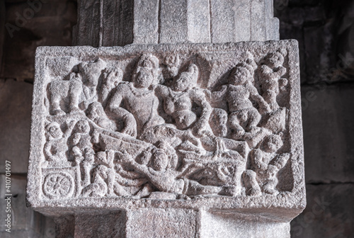 Bagalakote, Karnataka, India - November 7, 2013: Pattadakal temple complex. Gray stone erotic tableau sculpture set in pillar at ambulingeshwara temple. photo