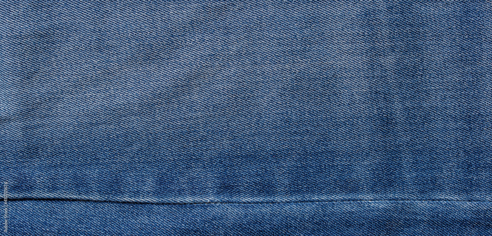 texture of blue jeans denim fabric background texture of blue jeans denim fabric background