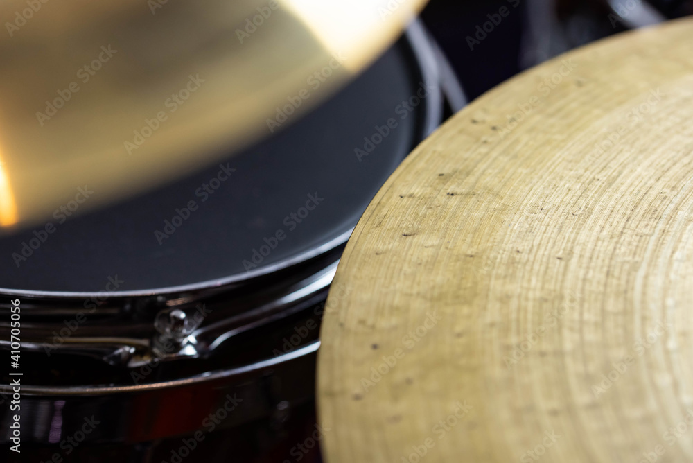 Closeup of drumsticks lying on the professional drum set. Drummer equipment. Closeup of drumsticks lying on the professional drum set. Drummer equipment.