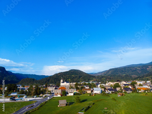 Aerial view. Mountains and buildings city, road, summer day sunset. Travel and tourism. green hills. Bohinjska Bistrica Slovenia, Triglav