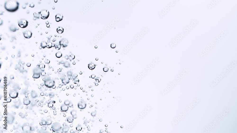 Super Slow Motion Shot of Water Bubbles at 1000fps on White Background. Super Slow Motion Shot of Water Bubbles at 1000fps on White Background.