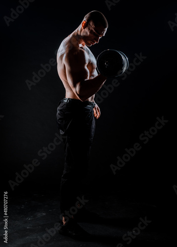 Bodybuilder athlete lifting weight