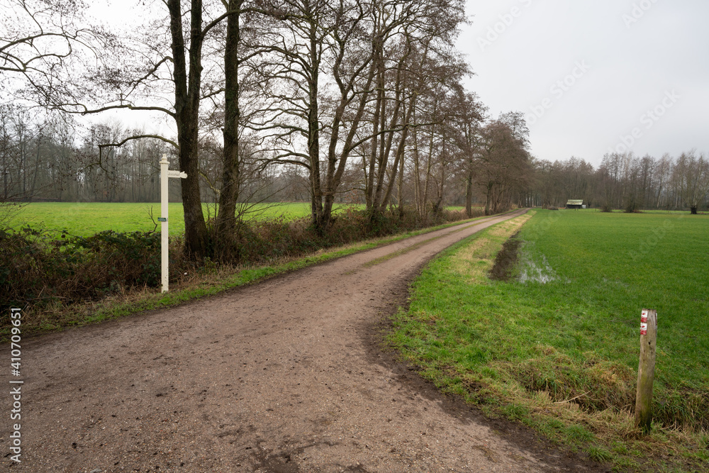 Sign post for Weverstraat (Weaverstreet) in Loenen, the Netherlands, at the edge of Veluwe and IJsselvallei (IJssel Valley) Sign post for Weverstraat (Weaverstreet) in Loenen, the Netherlands, at the edge of Veluwe and IJsselvallei (IJssel Valley)