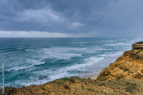 Arsuf cliff, a kurkar sandstone cliff reserve towering high above the Mediterranean sea coastline between Herzliya and Netanya towns, Israel. photo