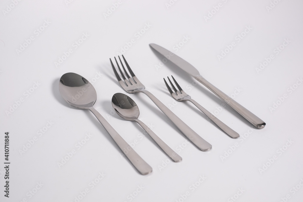 set of knives, spoons and forks isolated on a white background set of knives, spoons and forks isolated on a white background
