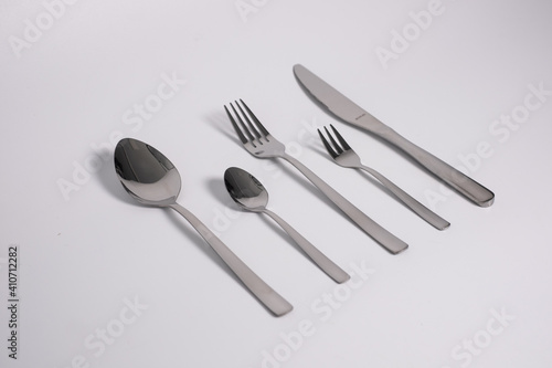 set of knives  spoons and forks isolated on a white background