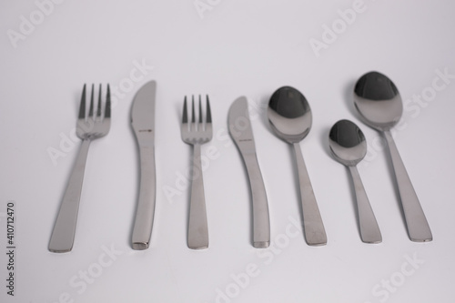 set of knives  spoons and forks isolated on a white background