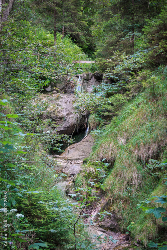 Gebirgsbach beim Wasserfallweg zum Aufstieg zur Alpspitz in Nesselwang in den Allgäuer Alpen Gebirgsbach beim Wasserfallweg zum Aufstieg zur Alpspitz in Nesselwang in den Allgäuer Alpen