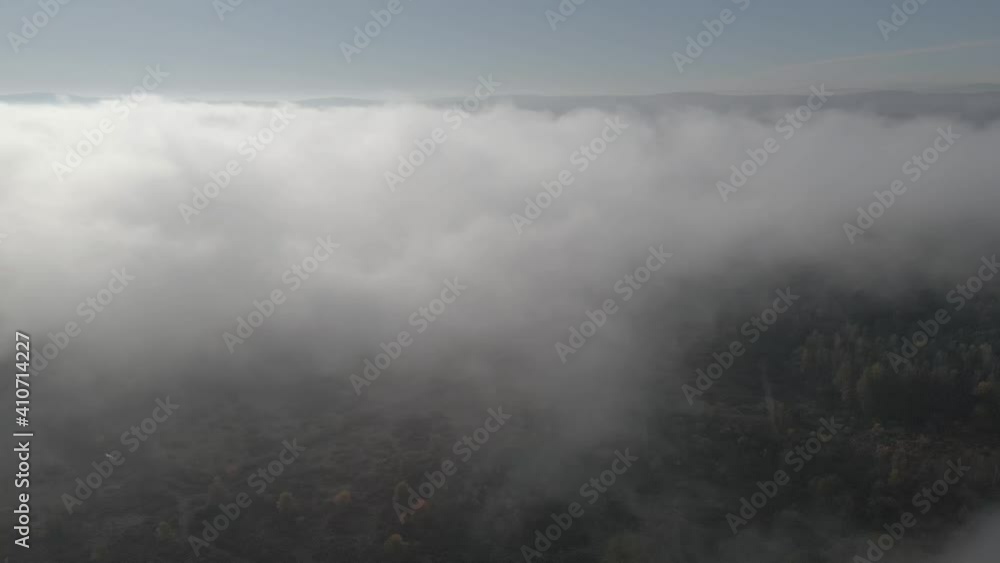 misty morning landscape above clouds in autumn misty morning landscape above clouds in autumn