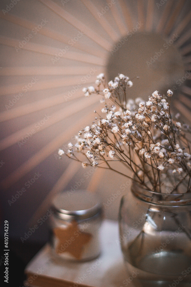 stylish white dried flowers in a glass jar