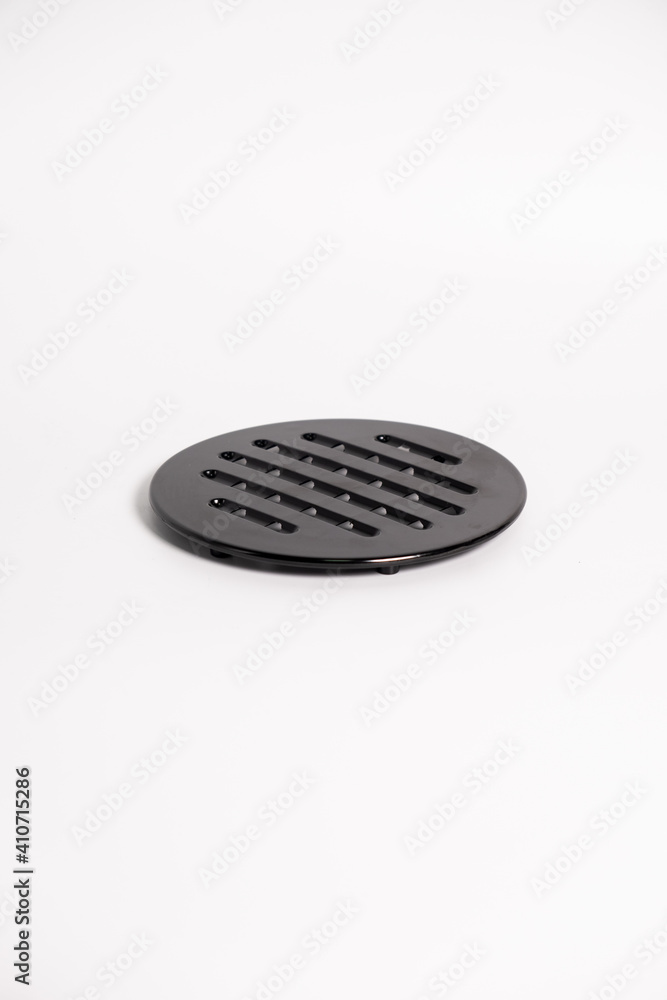 round black hot coasters, put hot utensils, on a white background, lie in a stack, isolate round black hot coasters, put hot utensils, on a white background, lie in a stack, isolate