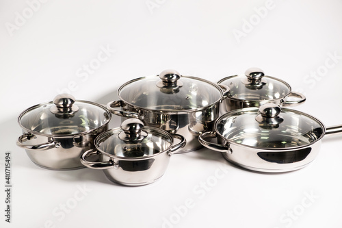 set of silver frying pans isolated on a white background