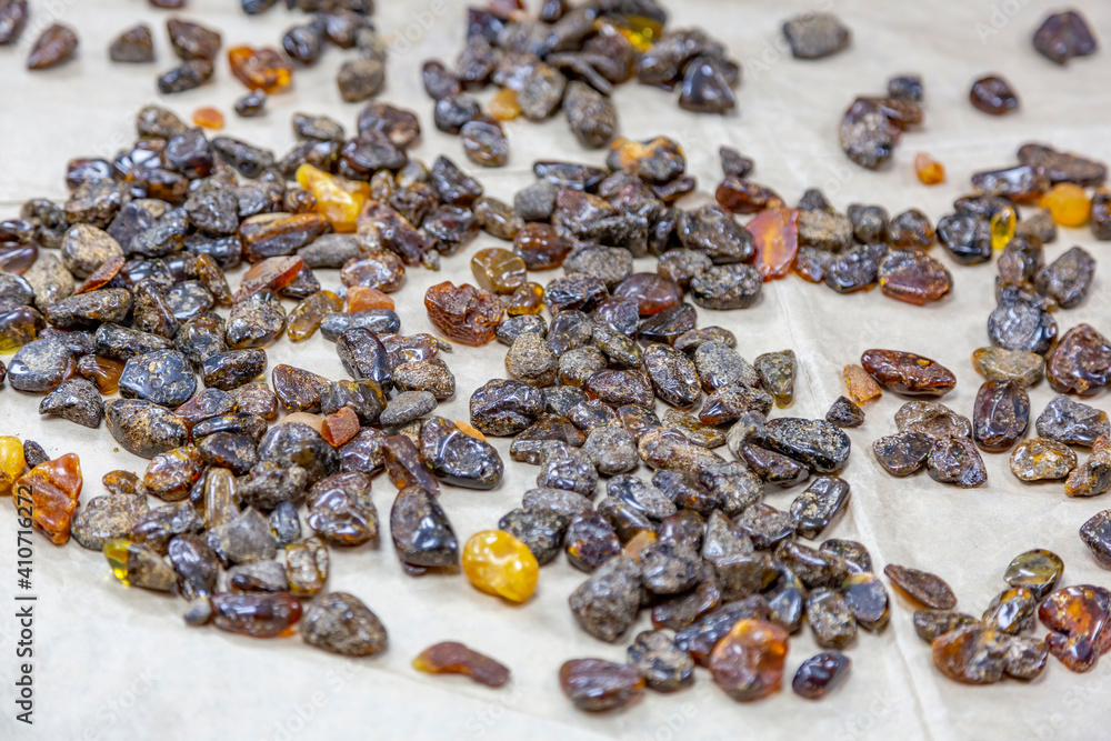 Obraz premium Beautiful stones of raw amber for making souvenirs and bijouterie