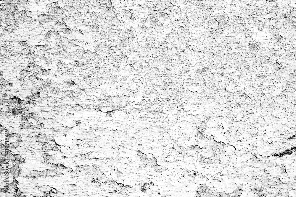 Texture of a concrete wall with cracks and scratches which can be used as a background Texture of a concrete wall with cracks and scratches which can be used as a background