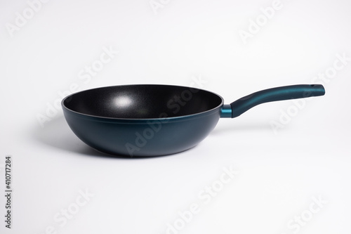 black frying pan isolated on a white background