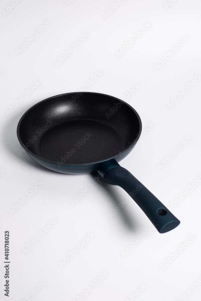 black frying pan isolated on a white background black frying pan isolated on a white background