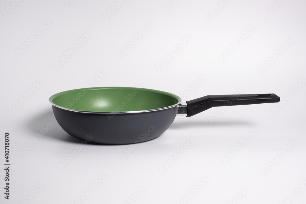 green grill pan isolated on a white background