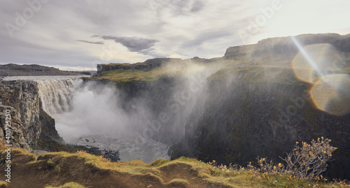 Majestic view of the Dettifoss waterfall at sunset