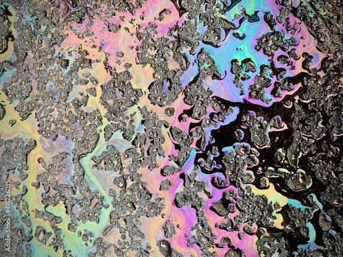 abstract oil slick on pavement