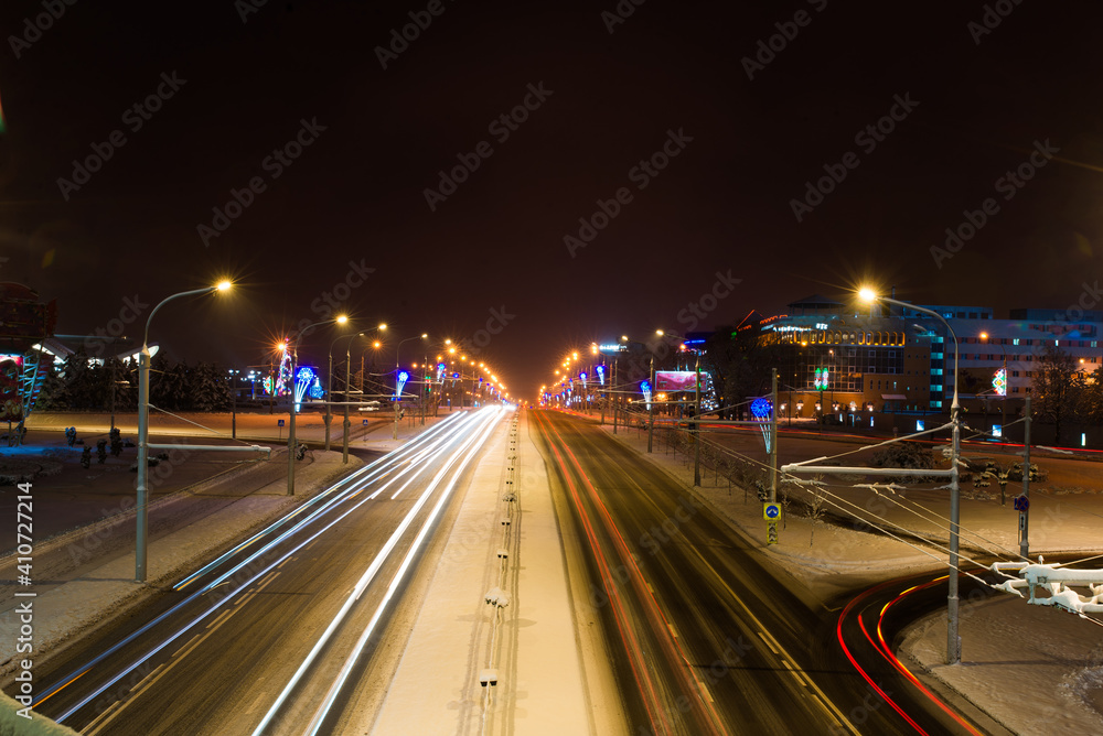 Road in the winter night, city, cars, lights, speed.