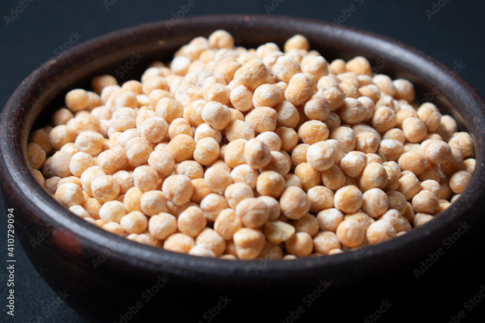 raw chickpeas in clay dish raw chickpeas in clay dish