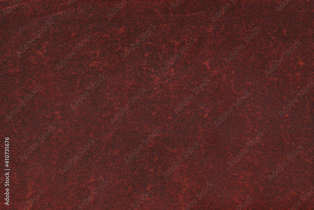 Fototapeta premium Cardboard red abstract pattern texture close-up. Retro old paper background. Grunge concrete wall. Vintage blank wallpaper.