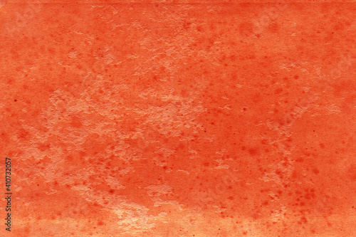 Cardboard red abstract pattern texture close-up. Retro old paper background. Grunge concrete wall. Vintage blank wallpaper.