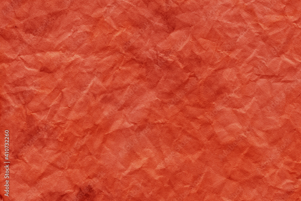 Fototapeta premium Cardboard red abstract pattern texture close-up. Retro old paper background. Grunge concrete wall. Vintage blank wallpaper.