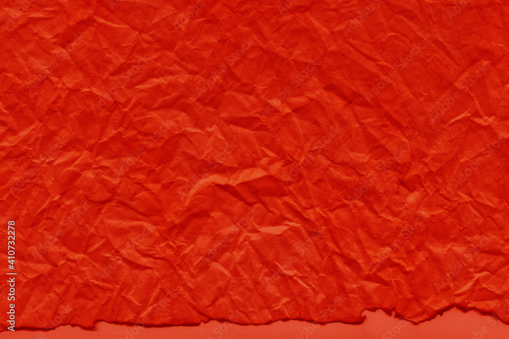 Fototapeta premium Cardboard red abstract pattern texture close-up. Retro old paper background. Grunge concrete wall. Vintage blank wallpaper.