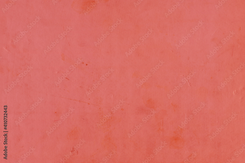 Fototapeta premium Cardboard red abstract pattern texture close-up. Retro old paper background. Grunge concrete wall. Vintage blank wallpaper.