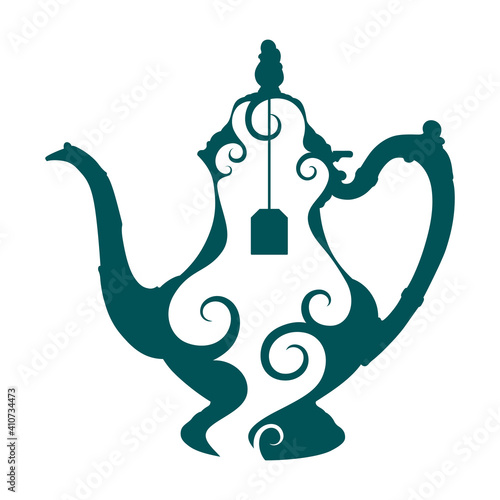 An ornate vintage teapot with a beautiful design in negative space
