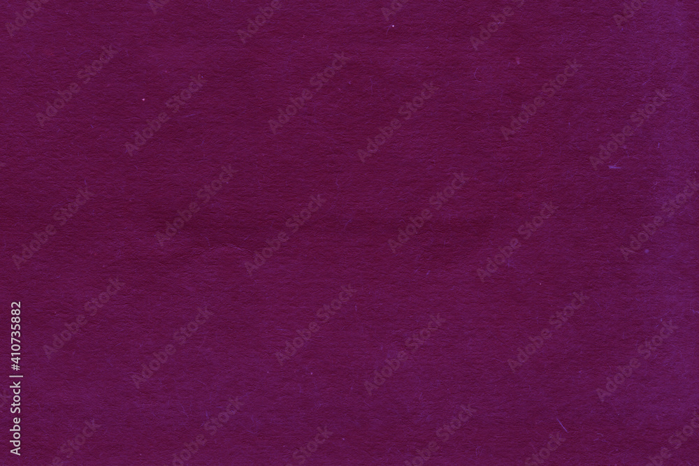 Fototapeta premium Cardboard red abstract pattern texture close-up. Retro old paper background. Grunge concrete wall. Vintage blank wallpaper.